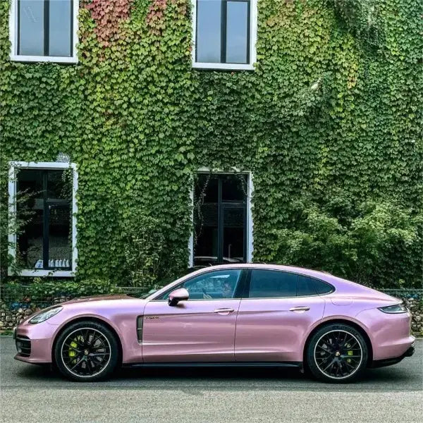 Pink vinyl wrap applied on car hood