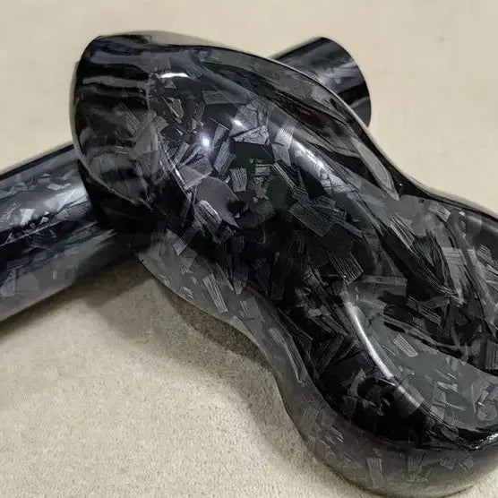 Black forged carbon wrapping vinyl car wrap close-up