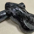 Black forged carbon wrapping vinyl car wrap close-up