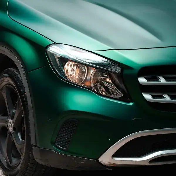 Chrome green metallic vinyl wrap close-up