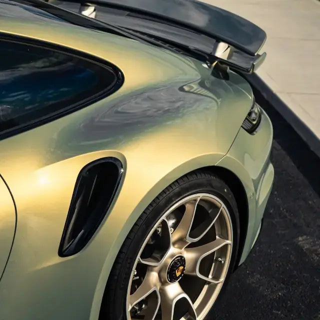 Urban gold vinyl wrap applied on vehicle