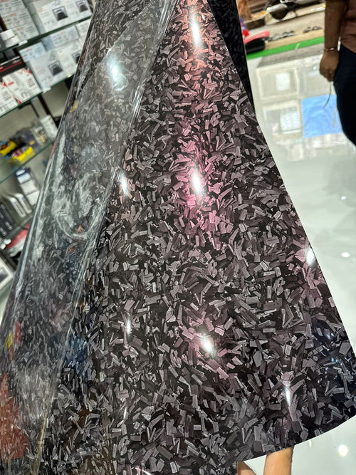 Black forged carbon with reddish tint wrap