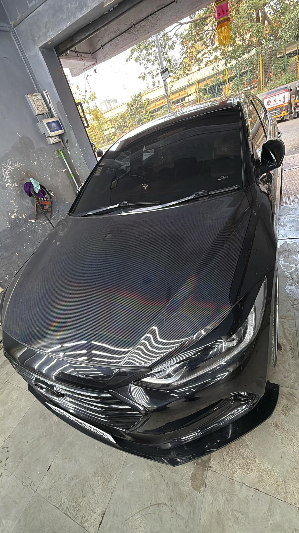 Black 5D laser rainbow carbon wrap on car India