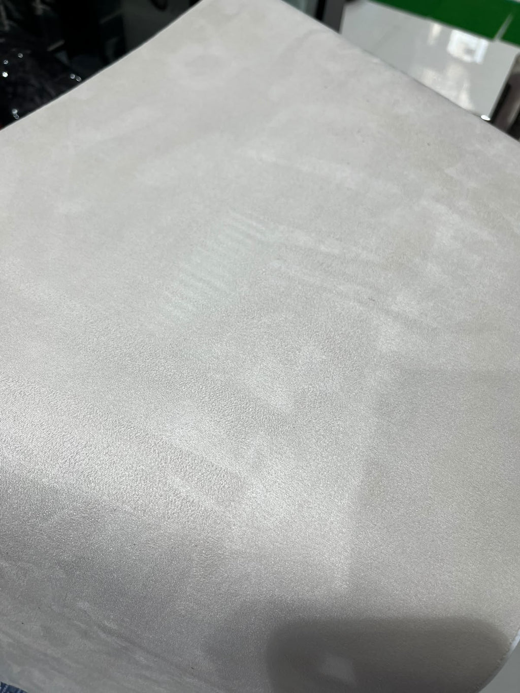 White alcantara fabric for car interior close-up detail