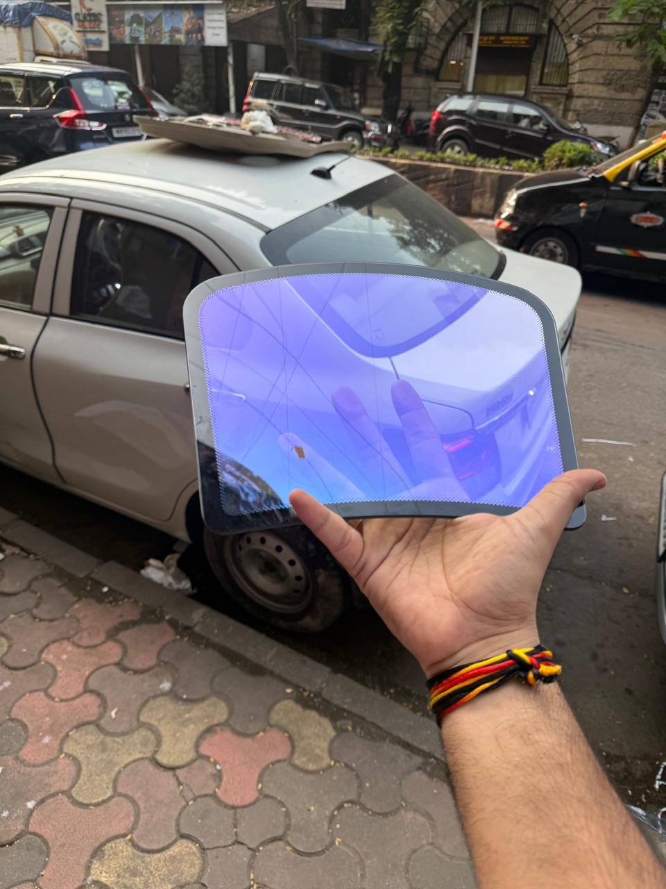 Dark blue ocean tint applied on car windshield