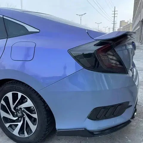 Blue to grey shift wrap applied on car